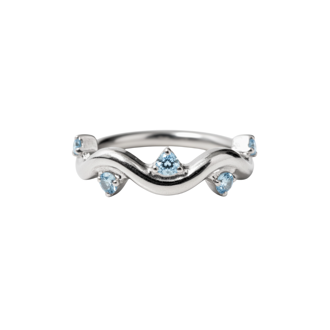 Ring with a swirl and blue gems