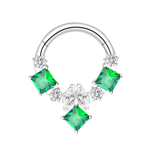Ring with green gems