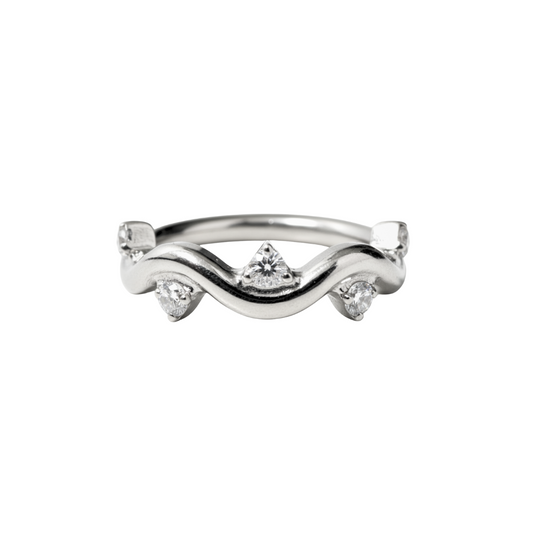Ring with a swirl and clear gems
