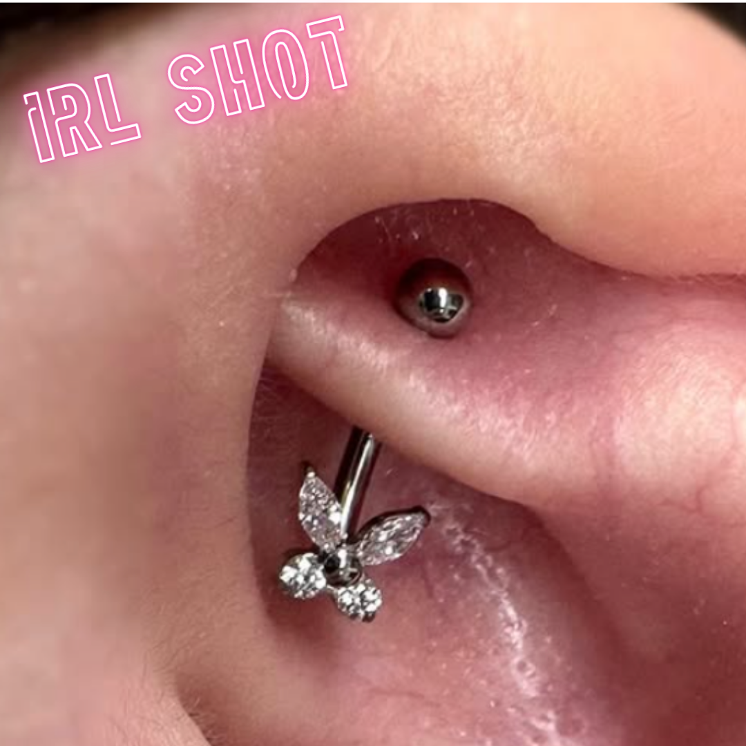 Eyebrow/rook barbell with a butterfly