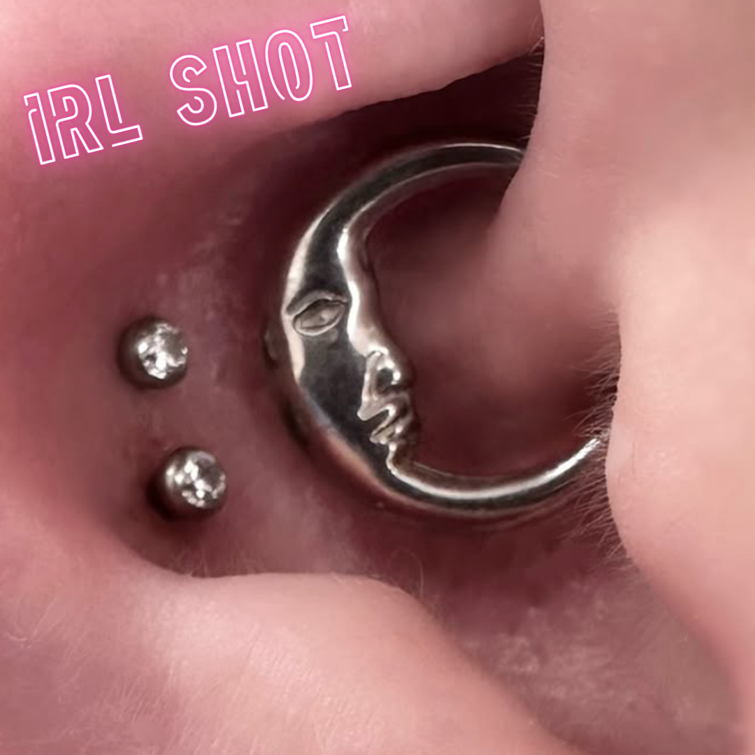 Žiedelis mėnulis su veidu