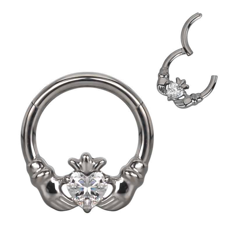 Ring with hands holding a heart