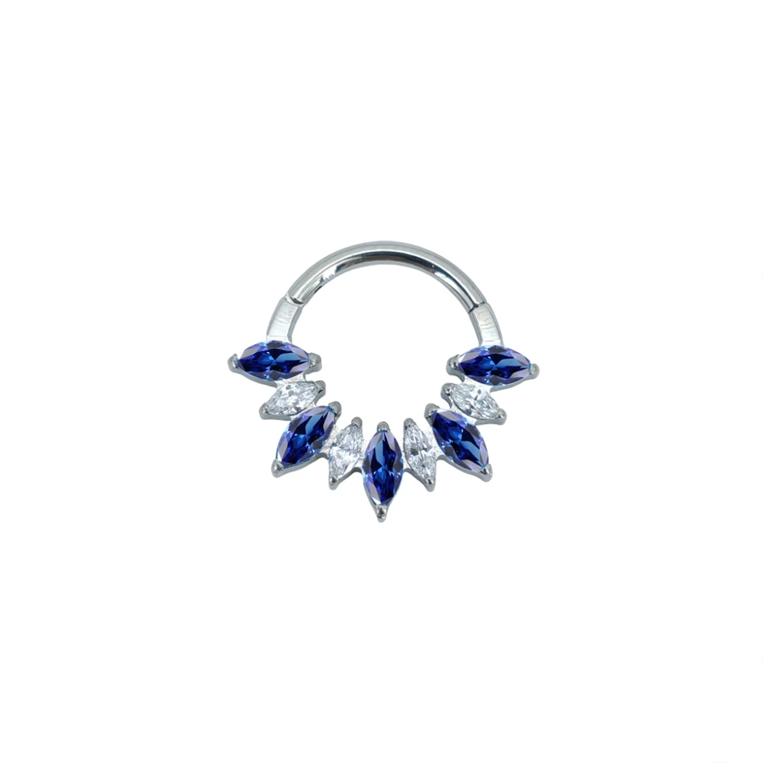 Ring with blue and clear marquise gems