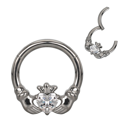 Ring with hands holding a heart