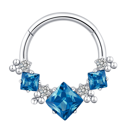 Žiedelis su mėlynais cirkoniais